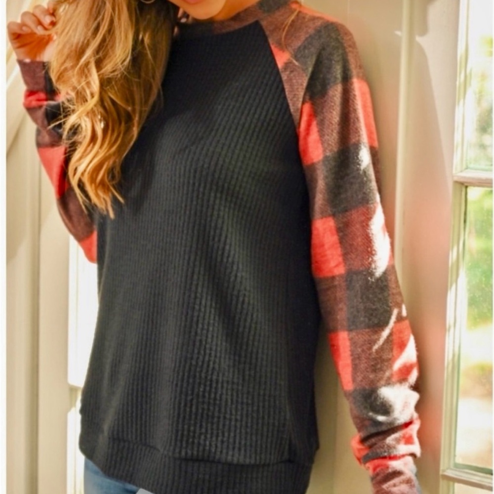 The sleeves our buffalo plaid top, so soft!